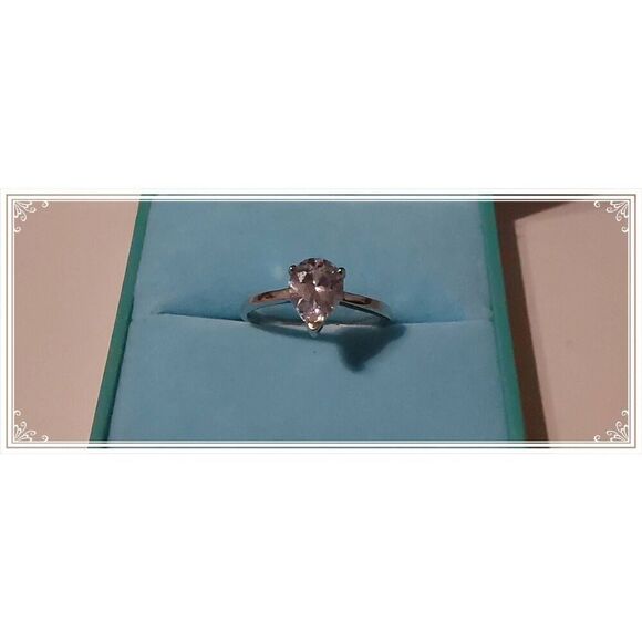 Stunning 1.5 Ct. Pear Cut Genuine Diamond Simulant Solitaire Engagement Ring #10 - Picture 1 of 4